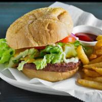 Hamburger · Half pound Angus Patty served with crispy fries, lettuce, tomato, onion, and mayonnaise on K...