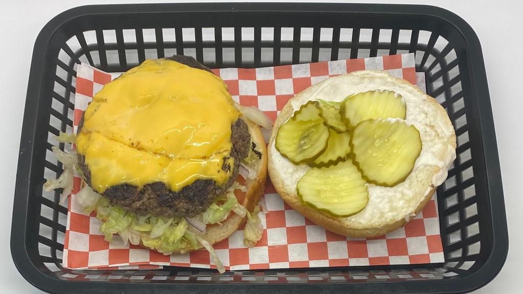 Double Cheeseburger · Double Cheese Burger Served with Lettuce, Tomatoes, Onions, Pickles and Mayo on Burger Bun