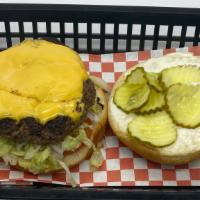 1/2 Pound Black Angus Burger · 1/2 Pound Angus Burger Burger Served with Lettuce, Tomatoes, Onions, Pickles and Mayo on Bur...
