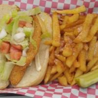 Catfish Fillet Sandwich · Fried Catfish Fillet on Hogue bun served with Mayo, Lettuce, Tomatoes.