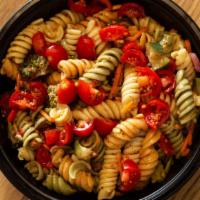 Zesty Italian Pasta Salad · Vegetable rotini pasta tossed with broccoli, cucumber, carrots, red onion and tomatoes in a ...