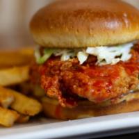 Nashville Hot Chicken Sandwich · Crispy chicken tossed in Sweet Baby Ray’s
Nashville Hot Sauce with lettuce, pickle chips, co...