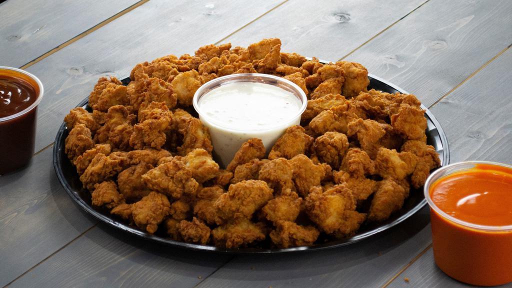 Boneless Wings Tray · Small, medium, or large hand-breaded and crispy boneless wings tossed in your choice of housemade sauce.