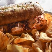 Grilled Chicken Ranchero · Marinated chicken, smoked bacon, red onions, mozzarella and ranchero sauce.
