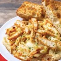 Chicken Alfredo · Penne pasta, creamy alfredo sauce, grilled chicken and a blend of Italian cheeses.