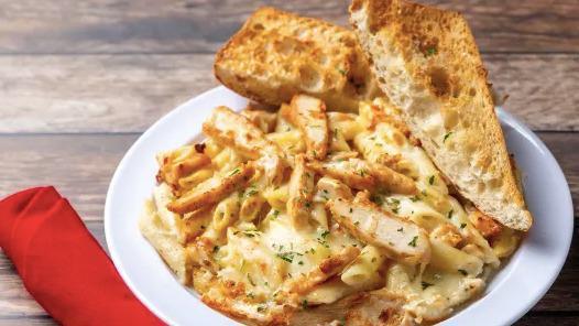 Chicken Alfredo · Penne pasta, creamy alfredo sauce, grilled chicken and a blend of Italian cheeses.