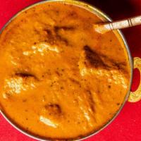 Rogan Josh · Traditional dish cooked with boneless lamb, onion, garlic, ginger, tomatoes, and curry spice...