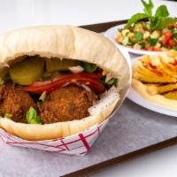 Falafel Pita · Stuffed with lettuce, tomato, onion, pickle, chickpeas, parsley, cilantro blended and fried,...