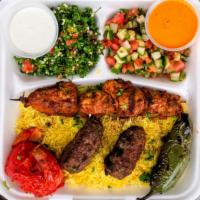 Combo Kabob Platter · Choice of two kabobs. Served over rice with pita and any two sides.