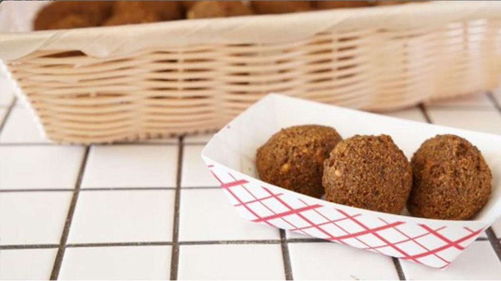 Falafel · Blend of chickpeas, parsley, cilantro, and house seasoning.