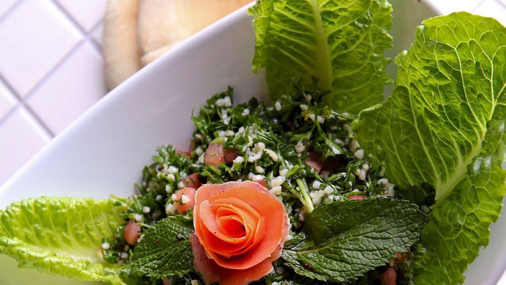 Tabouli · Parsley, tomato, wheat grain, and touch of lemon juice.