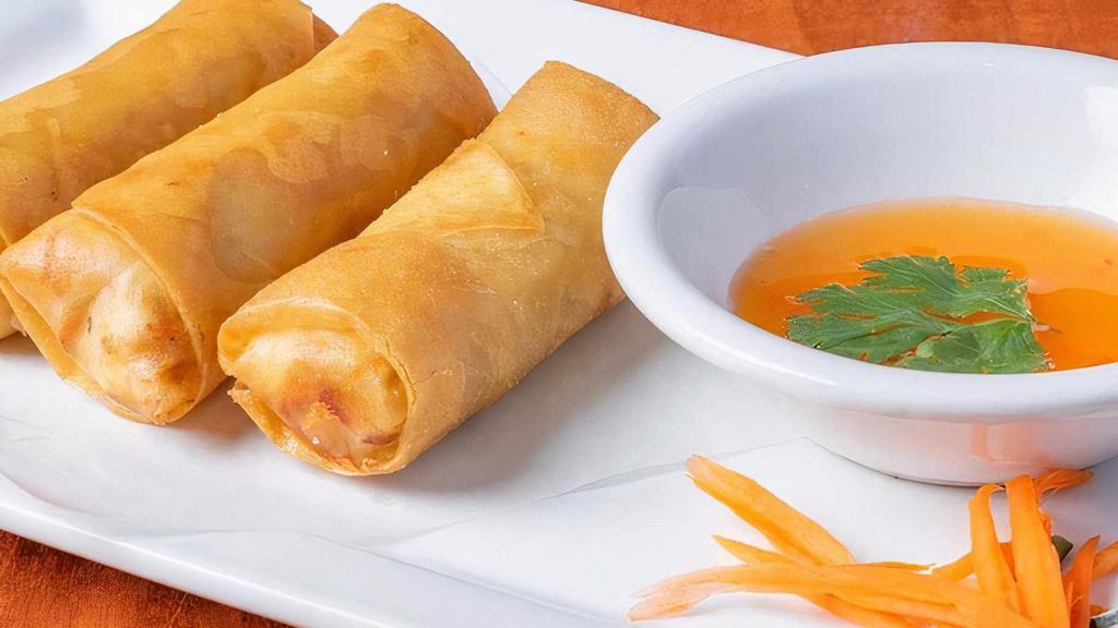 #4 Spring Rolls. · Deep-fried spring rolls filled with chicken, clear noodles, mixed vegetables. Served with Thai sweet and sour sauce.