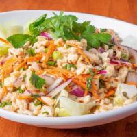 #23 Larb. · Choice of minced chicken, pork or beef seasoned with lime juice, chili peppers, cilantro, re...