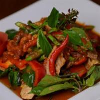 #51 Pad Three Kings. · Combination of chicken, pork, and beef sautéed with red curry sauce, green bean, basil and b...