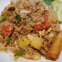 #69 Pineapple Fried Rice. · Fried rice with pineapple, vegetable, egg (and Chinese sausage if pork is chosen)