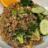 #70 Broccoli Fried Rice. · Fried rice with broccoli, onion, and egg.