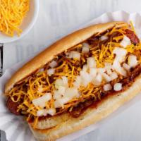 Detroit Coney · Beef hot dog topped with factory chili, shredded cheese, and onions.