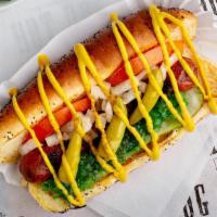 Chicago Dog · Grilled beef hot dog topped with tomatoes, pickle spear, sport peppers, green relish, onions...