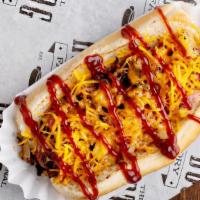 Hawaiian Dog · Beef hot dog topped with bacon, shredded cheese, grilled onions, grilled pineapples, and BBQ...