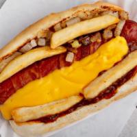La Dog · Bacon-wrapped beef hot dog topped with chili cheese fries, and grilled onions.