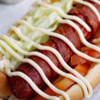 Blt Dog · Bacon wrapped beef hot dog topped with lettuce, tomato, and mayo