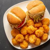Fluffy Vegan Chick’N Minis · 2  mini chick’n  patties with tomatoes, lettuce & vegan Mayo. Served with a regular order of...
