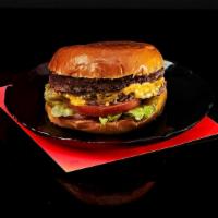 Cheeseburger · Juicy beef patty with cheddar cheese, lettuce, tomato, onion, pickles, and mayo on a toasted...