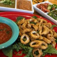 Crispy Calamari · Beer battered calamari rings, flash-fried & served with our Roasted Red Tomato Salsa