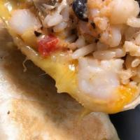 Shrimp And Chicken Burrito · Blackened shrimp & seasoned chicken wrapped with black beans, rice, roasted red peppers, gua...