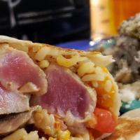 Honey Wasabi Tuna Burrito · Grilled Ahi Tuna wrapped with rice, mushrooms, carrots, celery, onions, peppers, tomato & mi...