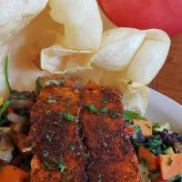 Salmon Baja Bowl · A huge taco bowl stuffed with seasoned rice, black beans & sautéed seasonal veggies served w...