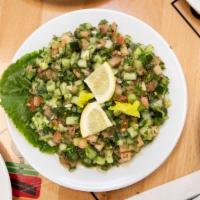 Arabic · Diced tomatos, green onions, cucumber, parsley + tangy lemon herb dressing. Vegetarian.