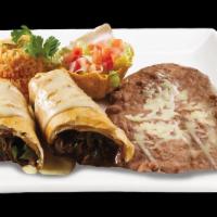 Guadalajara Special · Grilled beef and chicken breast served with Spanish rice, refried beans, lettuce, guacamole,...