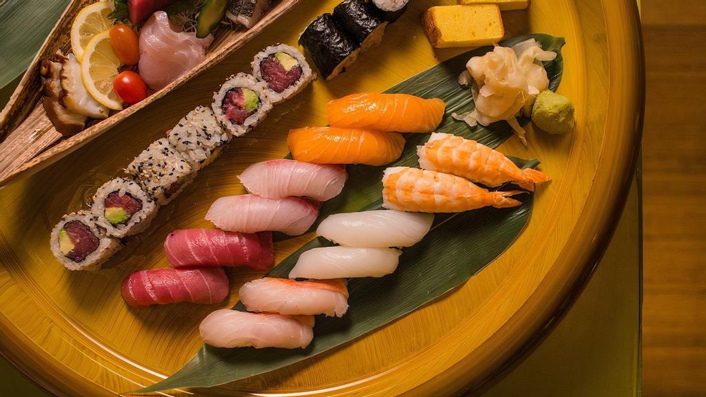 Sushi Regular · Chef's choice of eight pcs sushi and tuna roll.