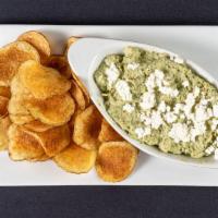 Crab Dip · Lump crab meat in a creamy mixture of spinach and artichokes, served with a side of house fr...