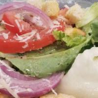Side Salad · Mixed lettuce, tomatoes, red onion, cucumbers, cheese and croutons.