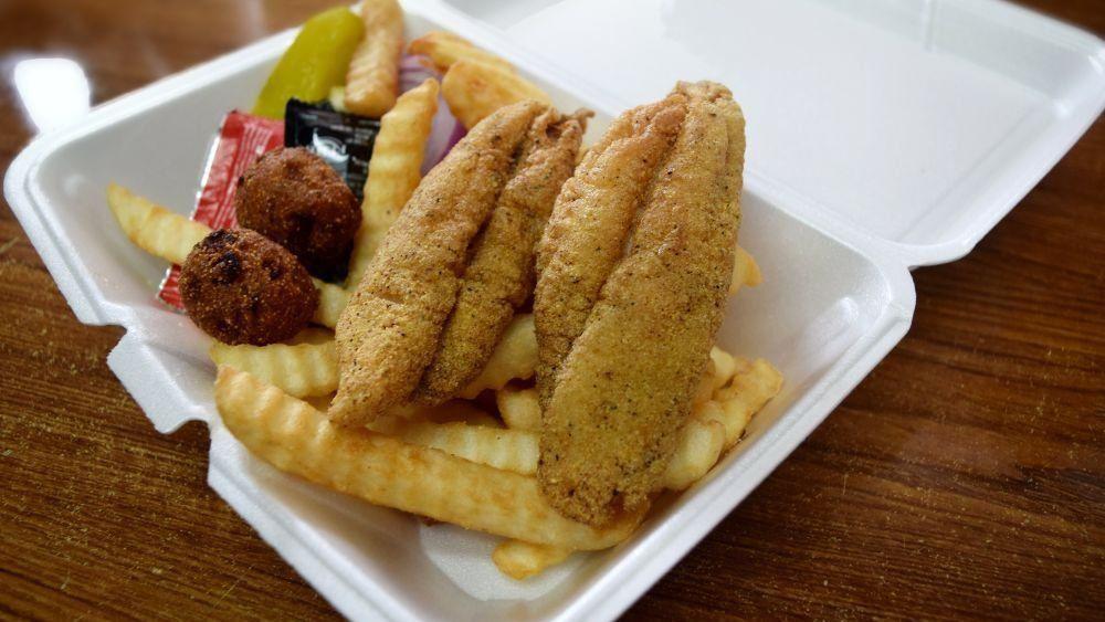 3 Pieces Fish Basket · Three filets, fries, hush puppies, pickle and onion.
tartar, and ketchup included.