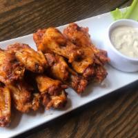 South Of Buffalo Wings · Spicy, gluten-free. Chicken wings tossed with your choice of our mild or spicy Caribbean jer...