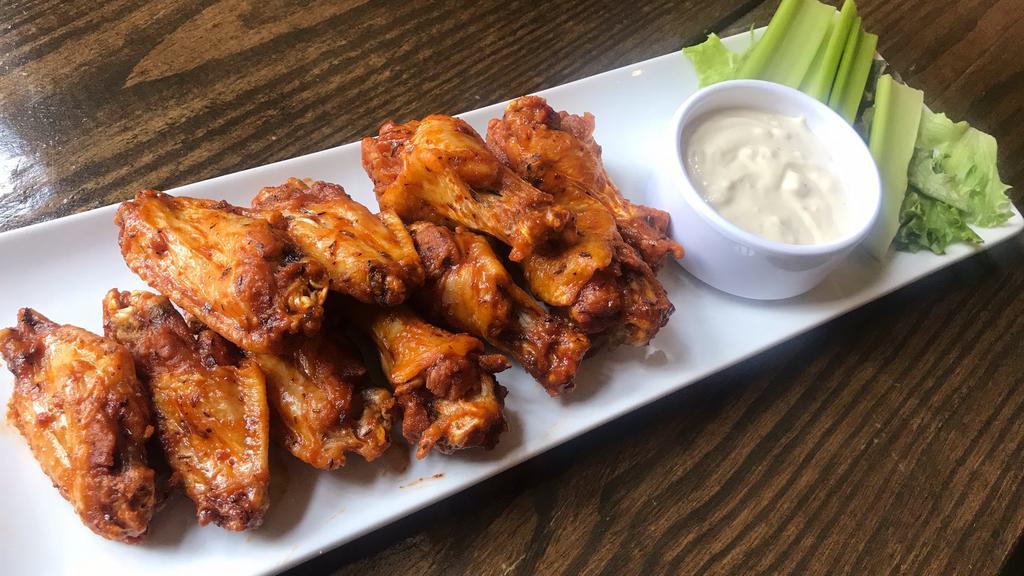 South Of Buffalo Wings · Spicy, gluten-free. Chicken wings tossed with your choice of our mild or spicy Caribbean jerk sauce or honey BBQ. Served with bleu cheese or ranch dressing and celery sticks.
