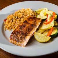 Salmon Lafayette · Gluten-free and spicy. Grilled salmon filet rubbed with brown sugar and Cajun spices, served...