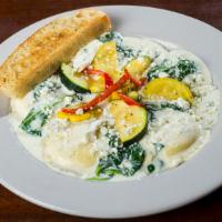 3 Cheese And Spinach Ravioli · Spinach ravioli filled with a 3 cheese blend and served with a Gorgonzola and spinach cream ...