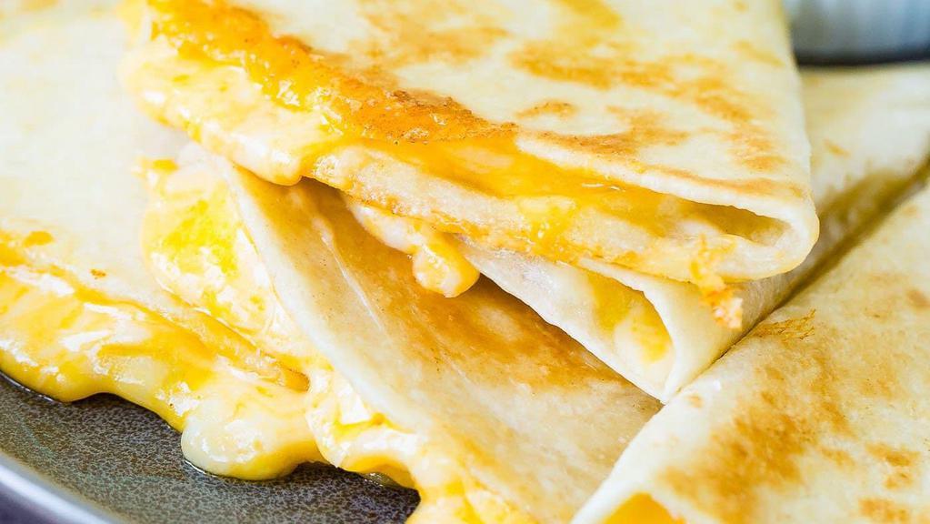 Flames Pita Quesadilla · Pita bread filled with your choice of meat: chicken, lamb & beef, and gyro.grilled peppers, onions, and mozzarella chesse