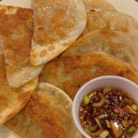 Fried Dumplings (10) · Pan fried pork chicken and vegetable dumplings.