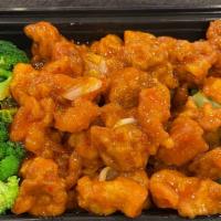 General Tso Chicken · Comes with white rice. A popular Chinese entrée made with fried chicken pieces coated in a s...