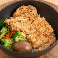 Pork Chop Rice Plate · Traditional Taiwanese fried pork chop ,comes with rice, vegetables and an egg.