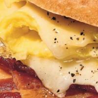 Mario'S Breakfast Sandwich · Eggs, cheese and all of the above! Ham, bacon and sausage.