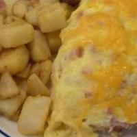 The Western Omelet · Grilled peppers, onions and ham.