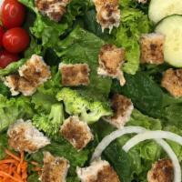 Chicken Salad · Fresh greens, cherry tomatoes, matchstick carrots, cucumbers, croutons, and onions topped wi...