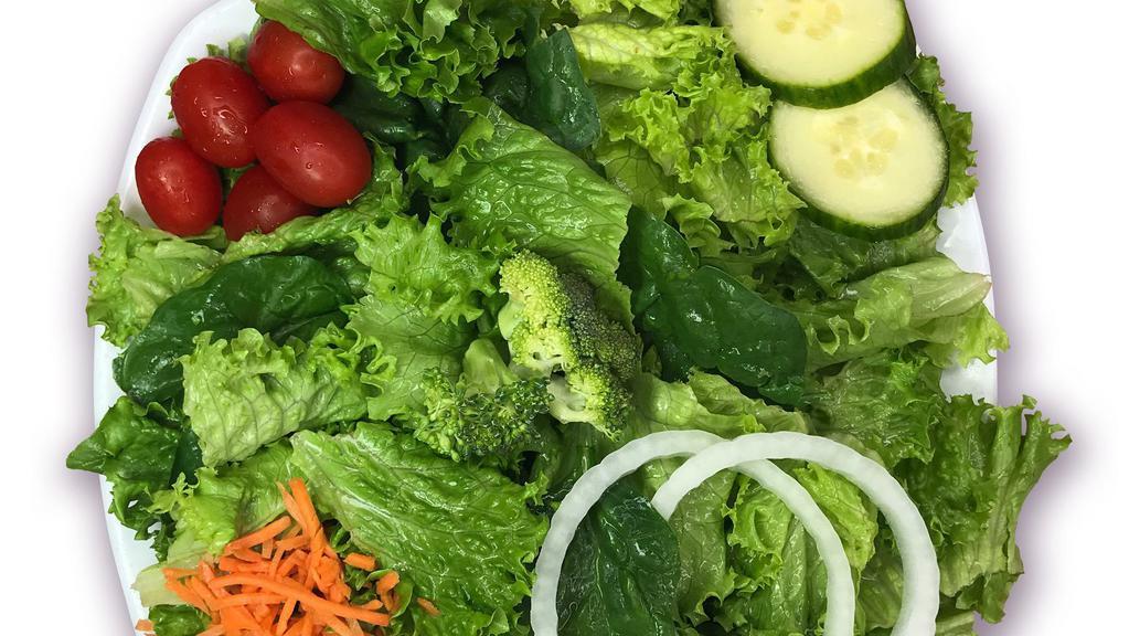 Garden Salad · Fresh greens, cherry tomatoes, matchstick carrots, cucumbers, and onions with your choice of dressing.