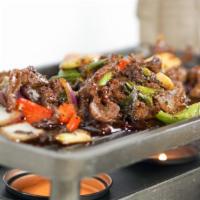 Black Pepper Beef · Spicy. Beef, bell pepper, onion, crushed black pepper.